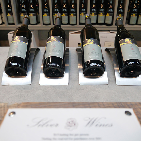 4 bottles of wine on display